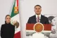 President Claudia Sheinbaum looks on during her daily, morning news conference, as Mexican Security and Citizen Protection Minister Omar Garcia Harfuch delivers a briefing