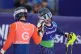 Neil Simpson, of Britain, celebrates with his guide Rob Poth after crossing the finish line in the alpine skiing men's alpine combined VI slalon event at the 2026 Winter Paralympics, in Cortina d'Ampezzo, Italy, March 10, 2026