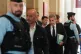 Former French President Nicolas Sarkozy, center right, arrives at the Paris appeals courthouse for his trial over alleged illegal financing of his 2007 presidential campaign by the government of late Libyan leader Moammar Gadhafi, March 16, 2026