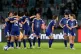 Japan players celebrate following the Women's Asian Cup semifinal soccer match between Japan and South Korea in Sydney, March 18, 2026