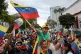 Venezuela fans celebrate a day after their team's victory over the United States in the championship match of the World Baseball Classic, at the Miraflores presidential palace in Caracas, Venezuela, March 18, 2026