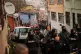 Police secure the way to a site where two residential buildings collapsed in Istanbul, March 22, 2026
