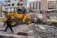 Civil Defense workers remove the rubbles of a destroyed building that was hit by an Israeli airstrike in Dahiyeh, Beirut's southern suburbs, Lebanon, March 24, 2026