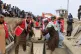 Coffins are placed in a grave during a second mass funeral for victims of an airstrike on a drug rehabilitation center earlier this month, in Kabul, Afghanistan, March 26, 2026