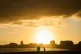 Fishermen on the Malecón seawall at dawn during a blackout in Havana, Cuba, March 22, 2026