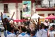 HIGH SPIRITS: During a school activity in a park in Havana on March 4 2026 while a man holds up a photo of Fidel Castro with an ‘in my heart’ message