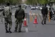 Members of the Basij paramilitary force stand at a checkpoint in Tehran, Iran, March 29, 2026