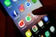 Social media apps on a mobile phone screen