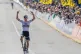 Slovenia's Tadej Pogacar crosses the finish line to win the Tour of Flanders cycling race, in Oudenaarde, Belgium, April 5, 2026
