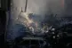 Firefighters spray smoldering debris at the site of an Israeli airstrike that struck a building in Beirut, Lebanon, April 8, 2026
