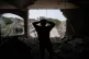 Assem Abdallah reacts as he enters his friend apartment destroyed in a Israeli airstrike in Kfar Roumman, southern Lebanon, Friday, April 17, 2026, following a ceasefire between Israel and Hezbollah
