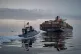 A Revolutionary Guard Navy speedboat approaches the cargo ship Epaminondas during the seizure of one of two vessels in the Strait of Hormuz, April 21, 2026