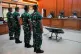 Indonesian military personnel accused of carrying out an acid attack on human right activist Andrie Yunus, stand in attention during their trial at a military court in Jakarta, Indonesia, April 29, 2026