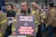 Firefighters from the Fire Brigades Union (FBU) take part in the Cuts Leave Scars rally outside the Scottish Parliament in Edinburgh, October 26, 2023