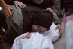 Amina Al-Abed mourns over the body of her 9-year-old son, Abdullah, who was killed in an Israeli airstrike, during his funeral at Al-Shifa Hospital in Gaza City, April 23, 2026