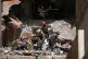 Lebanese Civil Defense workers search through rubble for the body of missing student Ali Srour, 17, at the site of a building destroyed in an Israeli airstrike on Wednesday, in central Beirut, Lebanon, April 11, 2026