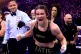 Katie Taylor celebrates after winning her Undisputed Super Lightweight Championship title fight against Chantelle Cameron in Dublin, Ireland, November 25, 2023
