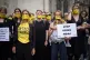 Campaigners from Can't Buy My Silence and Pregnant Then Screwed, take part in a protest outside the Royal Courts of Justice, central London, to highlight non-disclosure agreements (NDAs) being used to stop women making complaints about harassment at work, May 14, 2024