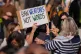 People take part in a Palestine Solidarity Campaign march in central London, October 11, 2025