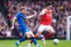 Arsenal's Declan Rice (right) and Bournemouth's Adrien Truffert battle for the ball during the Premier League match at Ashburton Grove, London, April 11, 2026