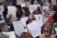 Protesters hold up placards at a demonstration against the ban on Palestine Action, in Trafalgar Square, central London, April 11, 2026