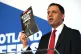 Scottish Labour leader Anas Sarwar holds up a manifesto booklet during the launch of the party's manifesto for the upcoming Holyrood election, at the University of Edinburgh Hospitality and Events Collection in Edinburgh, April 13, 2026