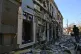 A person walks near residential houses damaged by a Russian strike in Odesa, Ukraine, April 27, 2026