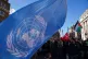 A United Nations flag is waved during the 