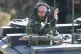 German Chancellor Friedrich Merz drives in the armoured fighting vehicle Boxer during his visit to the army at the Bundeswehr base in Munster, Germany, Thursday, April, 30, 2026