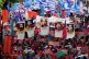 Protesters hold posters of communist figures as they march towards the Malacanang presidential palace during a May Day rally in Manila, Philippines on Friday, May 1, 2026