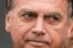 Former President Jair Bolsonaro, temporarily allowed out of house arrest for medical treatment, departs a hospital in Brasilia, Brazil, September 14, 2025