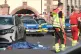 Rescue workers stand next to a damaged car that has crashed into several people in Leipzig, Germany, May 4, 2026