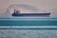 A bulk cargo ship sits at anchor in the Strait of Hormuz off Bandar Abbas, Iran, May 2, 2026