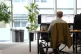 Office worker at a desk and monitors