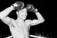 John Conteh celebrates winning the World Light Heavyweight title after his split decision victory