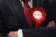 A rosette worn by a Labour Party candidate