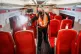 A cleaner uses a fogging machine to clean a train carriage during the night, March 17, 2021