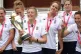 England women’s cricket team pose with the World Cup trophy