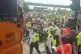Activists block a lorry from entering the DSEI arms fair sit