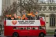 Campaigners circle Parliament aboard an open-topped bus