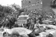 CRUCIAL HISTORY: A silent crowd follows the funeral processi