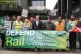 RMT general secretary Mick Lynch (centre) joins members of h