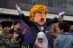 EMPTY POSTURE: Children accost Donald Trump in effigy during