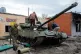 A Russian tank sits abandoned after fighting in the town of 