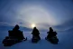 ICY: People on ski-doo’s admire an optical ‘halo’ prod