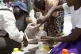 Cooking oil is distributed in Zimbabwe amid a drought descri