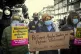Activists from Stand Up to Racism hold a demonstration to de