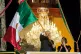 Mexican President Andres Manuel Lopez Obrador rings the bell