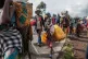 DESPERATE: People fleeing the fighting between government fo