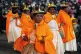 Aymara women dressed as Christmas Wizard Kings dance during 